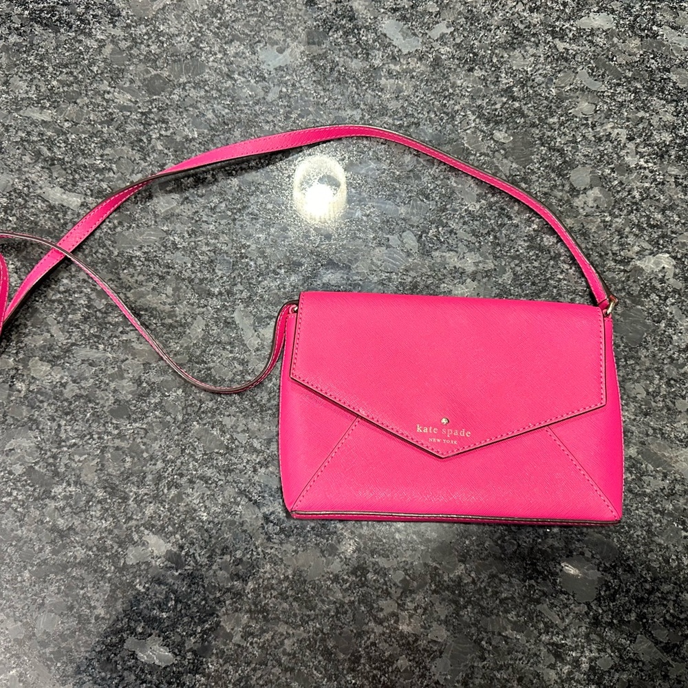 Pink Fuchsia Kate Spade envelope crossbody purse with polka dot lining
